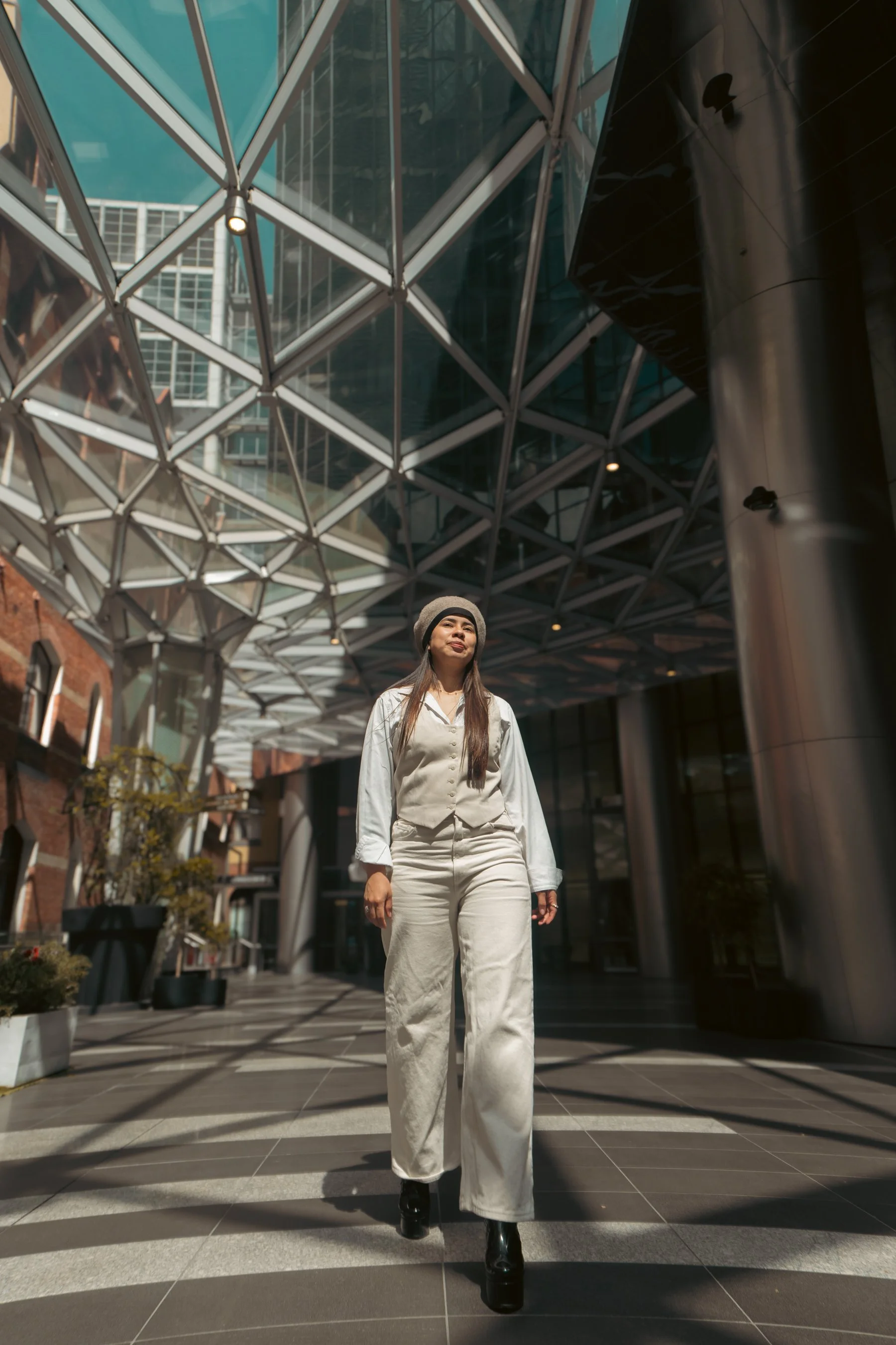 street-portrait-woman-walking-glass-atrium-melbourne.jpg.jpg