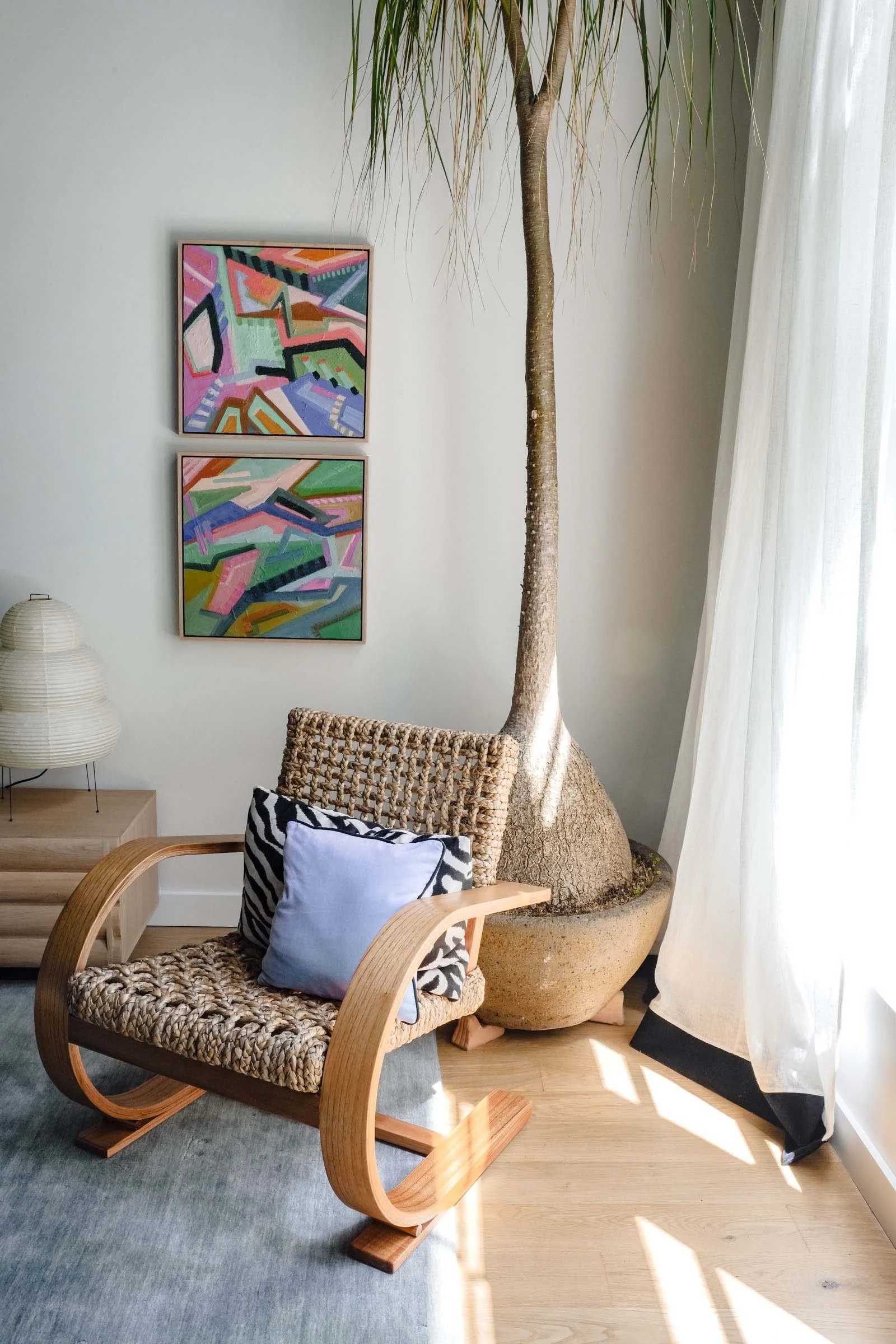 interiors photography Melbourne - photo of chair and painting in apartment