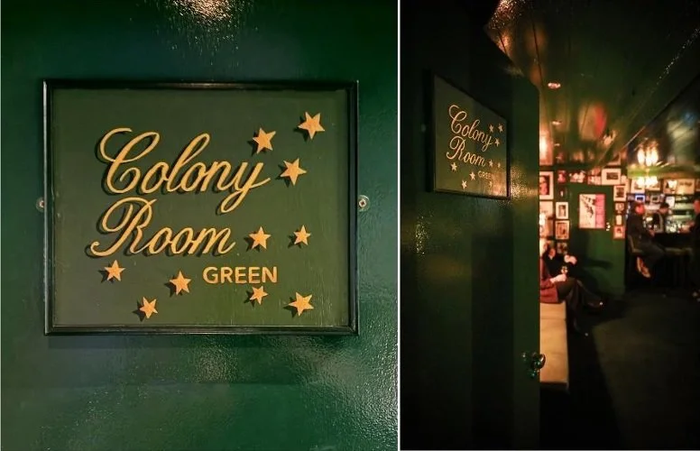 A sign on a green wall reading 'Colony Room GREEN' with star decorations, and the entrance to a dimly lit room with people inside.