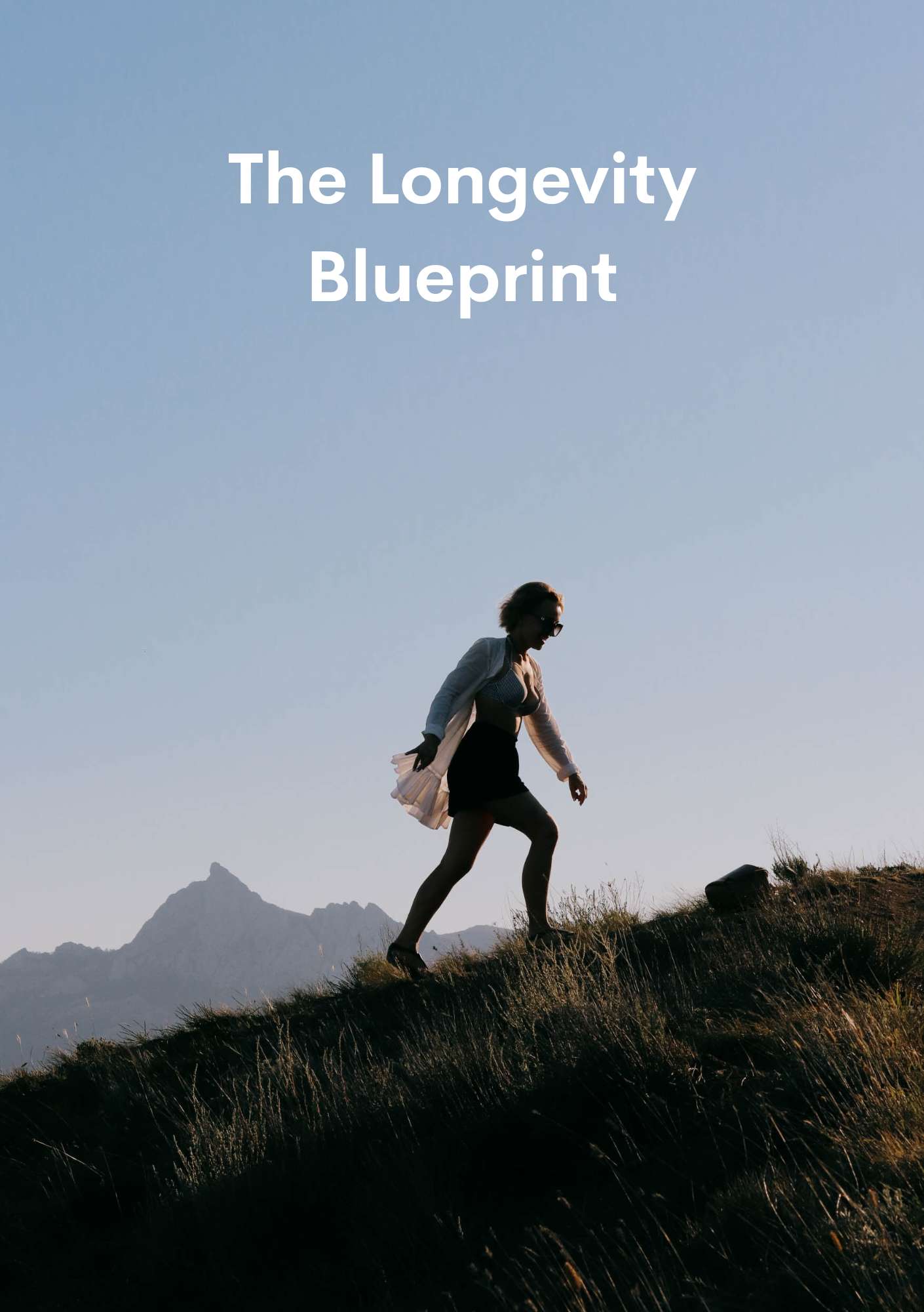 Image of person walking up a hill