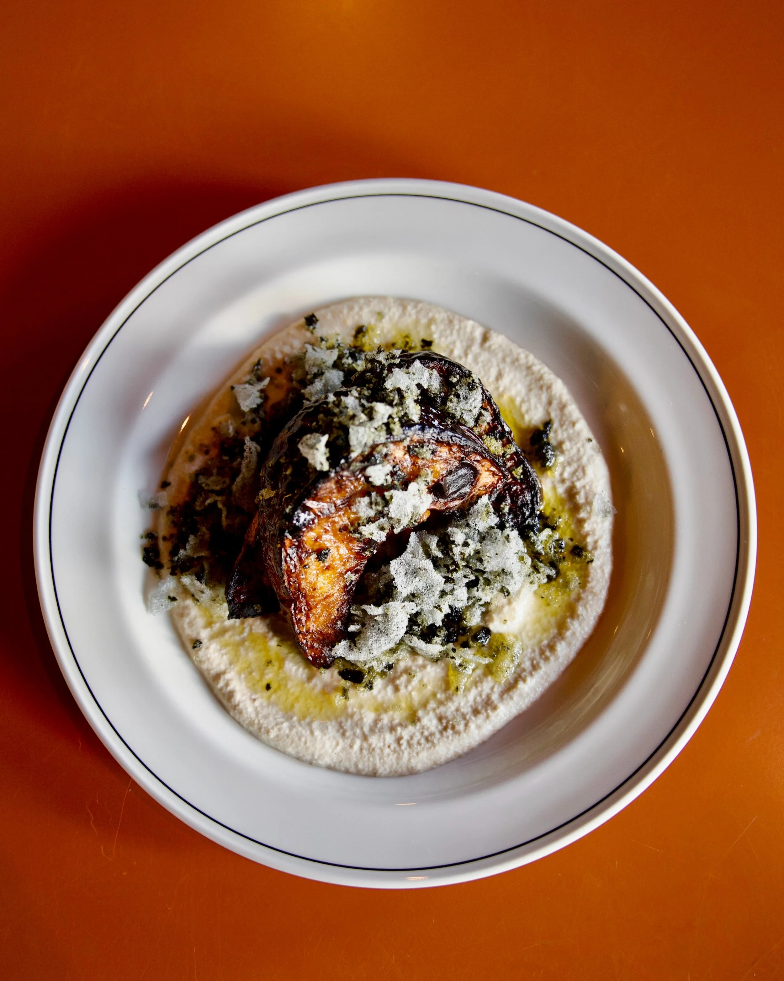 New on our menu: Charred Pumpkin with almond cream, nori, and sunflower. A study in seasonal contrasts&mdash;sweet, creamy, savory, and bright. ONLY for the cooler months. 

Fridays 5pm - late 
Bookings Via DM