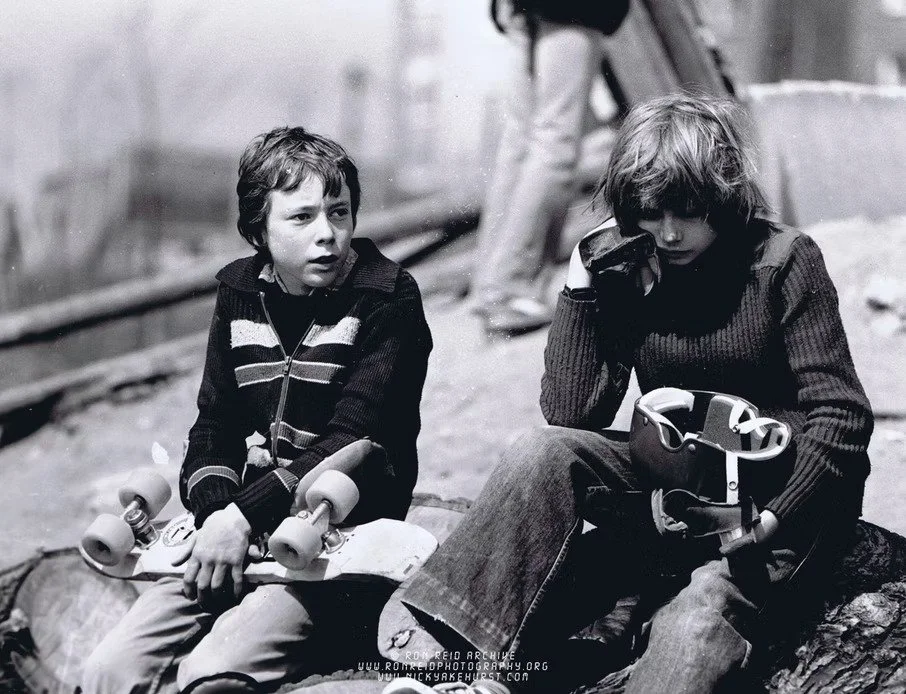 Skateboarder boys sitting.jpg