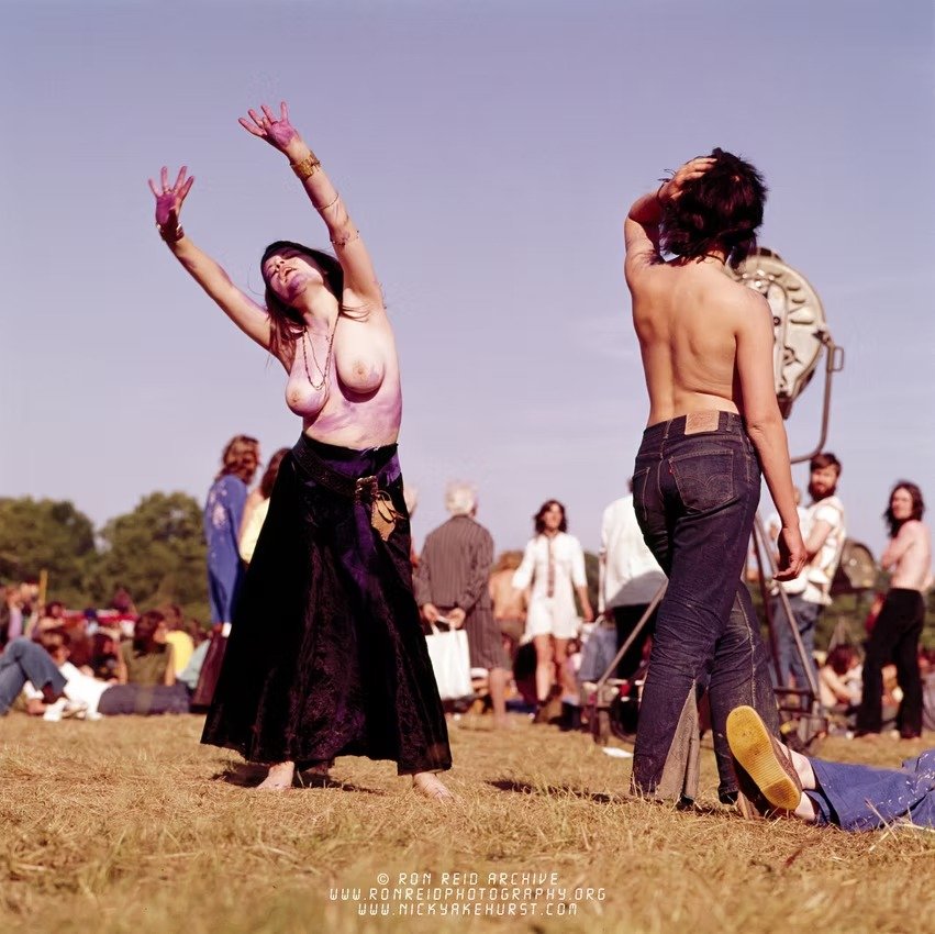Glastonbury topless dancer colour.jpg