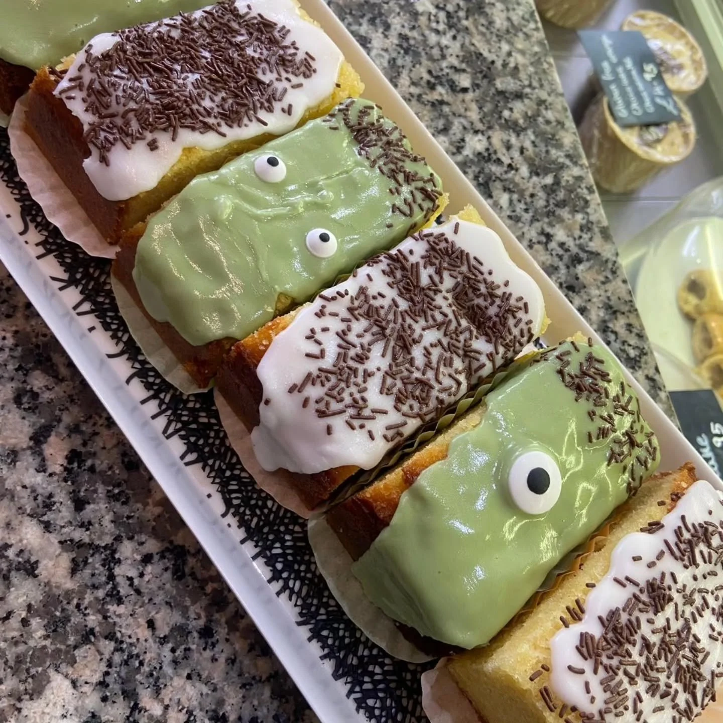 💚👻 HALLOWEEN FEATURE POST: HOMEMADE OLD SCHOOL FRANKENSTEIN CAKE

Look out for our Specail &quot;Grinions&quot; hidden amongst them Our &quot;Green Minions&quot;

💚⚡ He&rsquo;s ALIVE&hellip; and delicious! 🧟&zwj;♂️
Bring some frightful fun to you