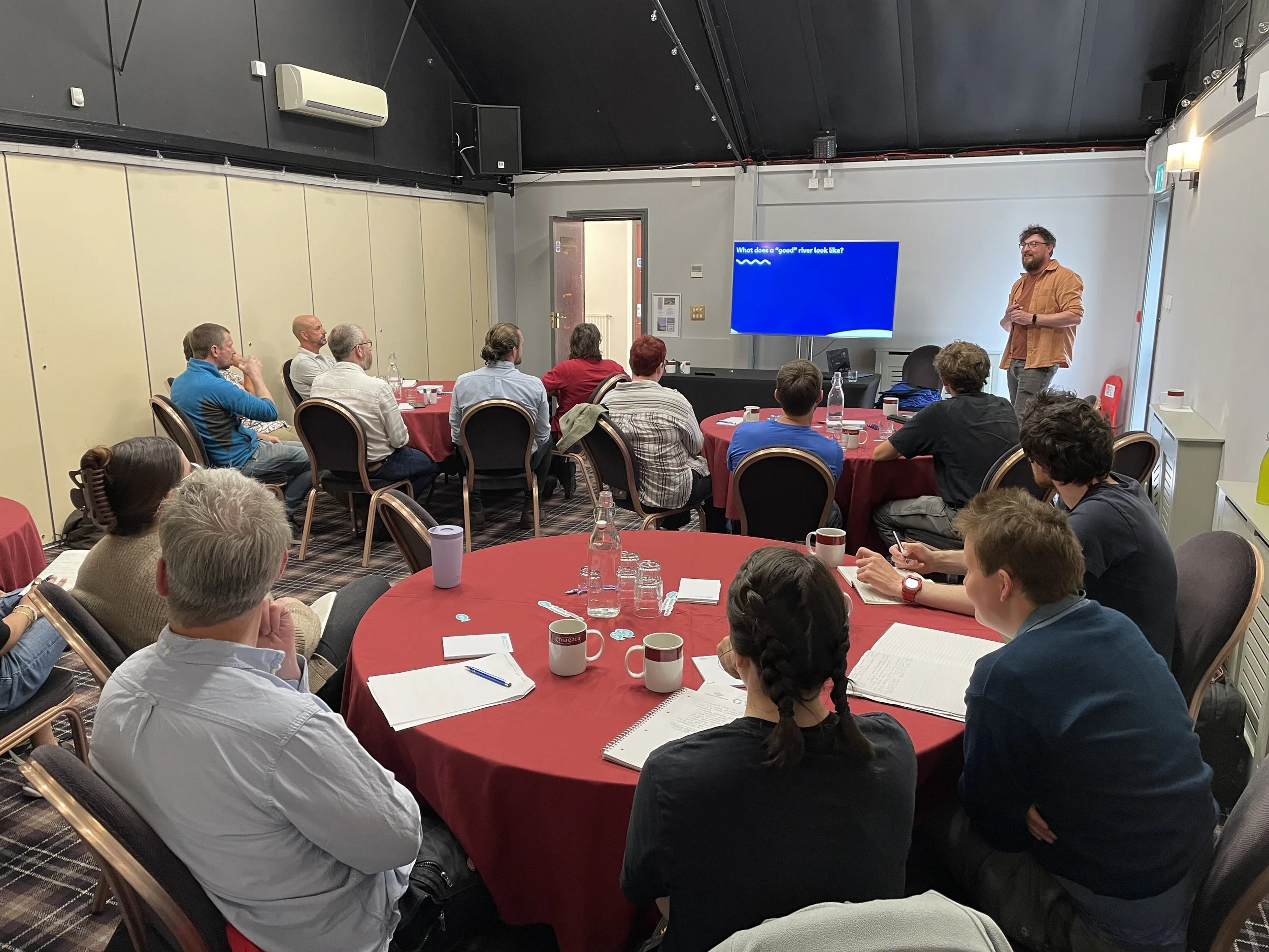 GYR partners sat in meeting room as part of the partnership barrier removal course