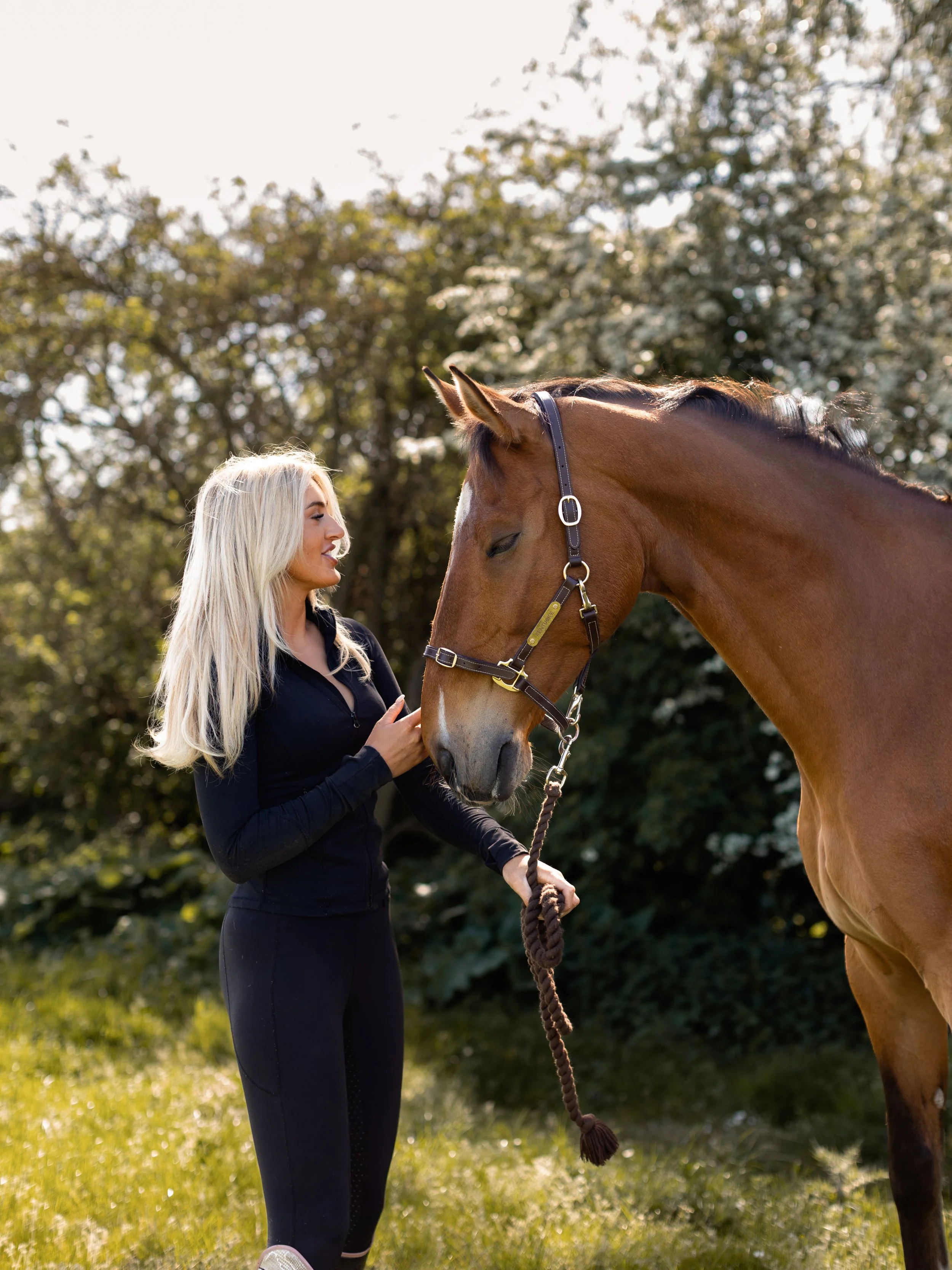 Horse and owner portrait outdoors during an equine photography session in Essex.