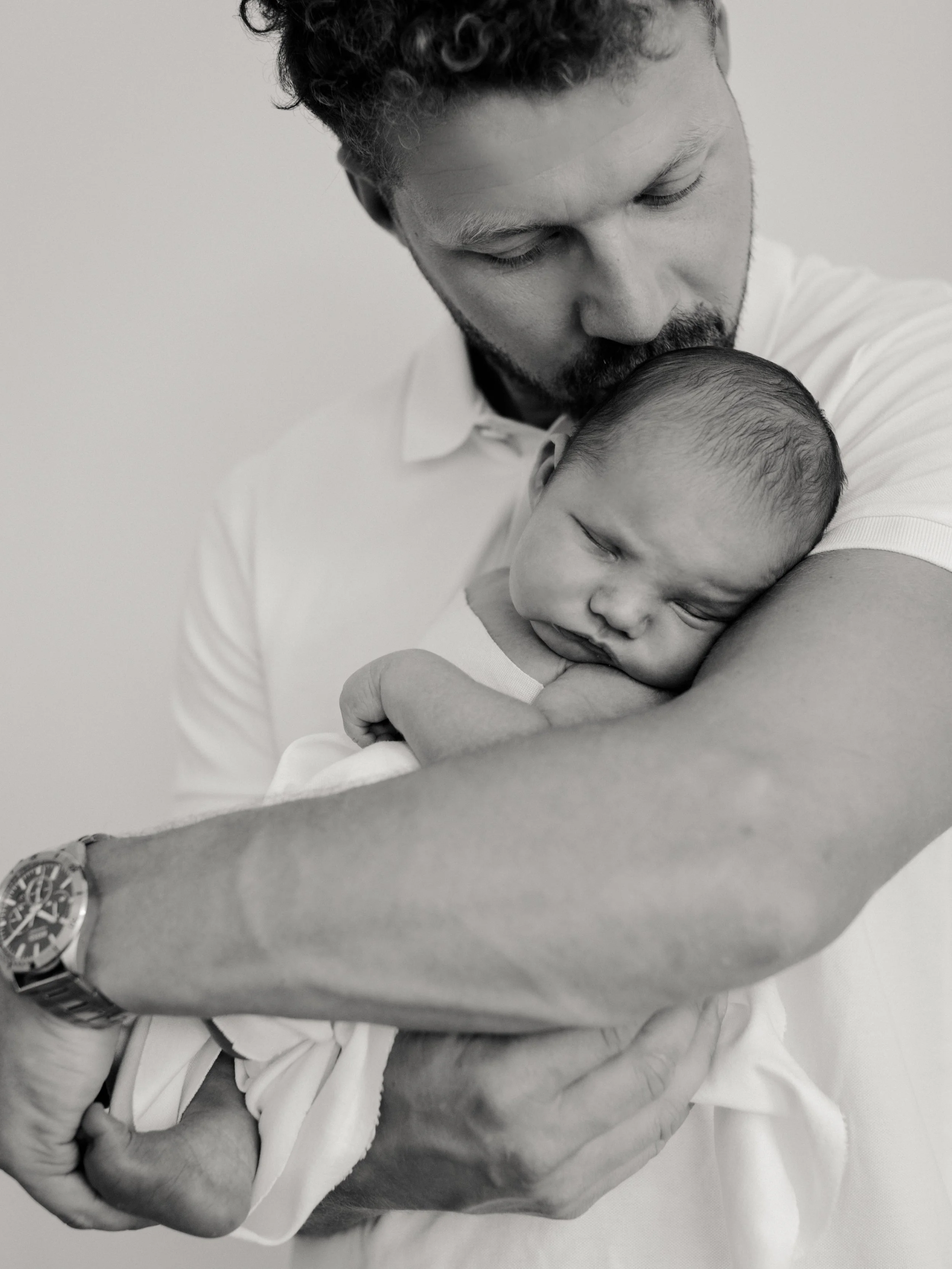 Dad and baby photographed at Emma Rose Studio