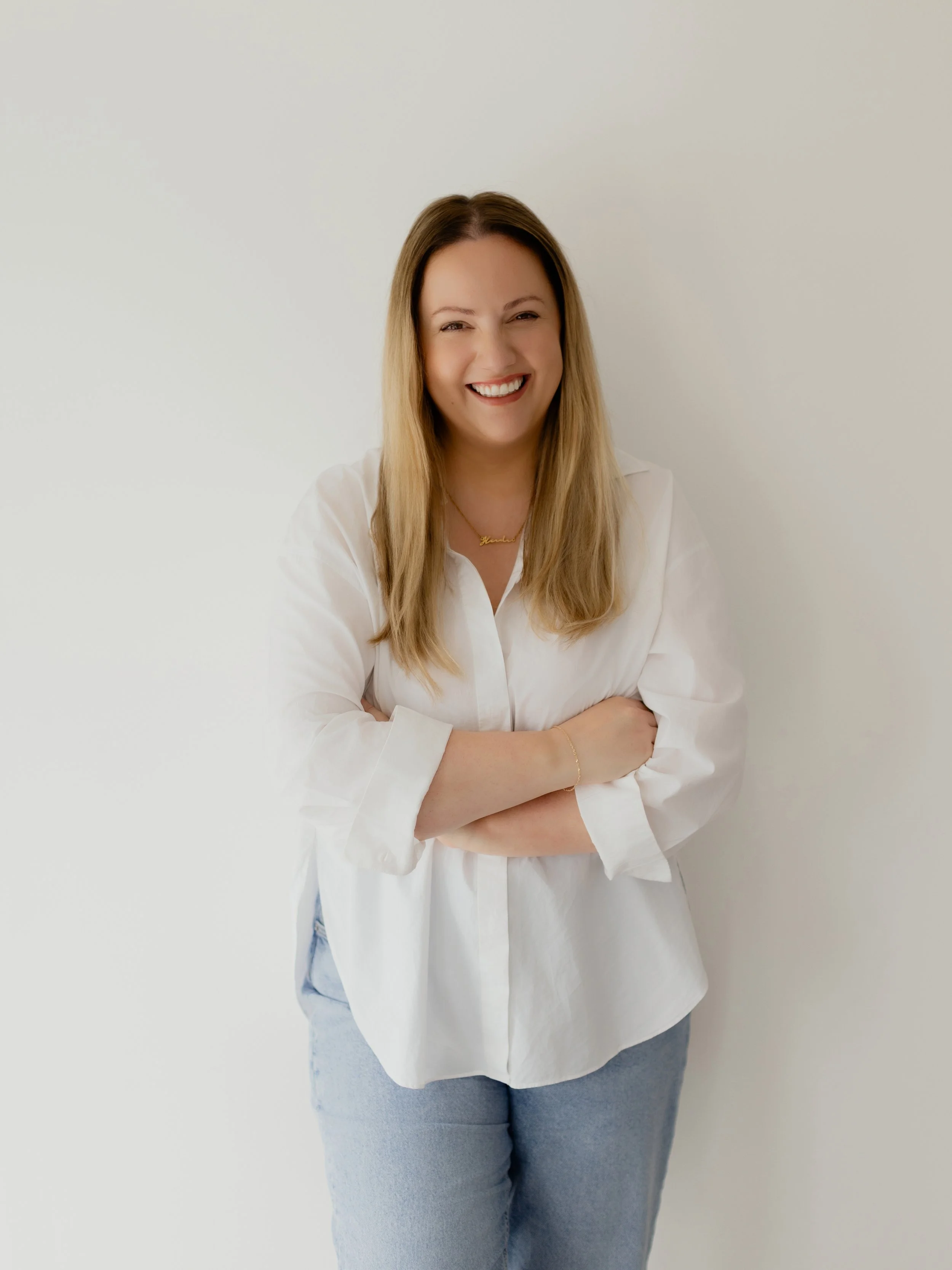 Natural professional headshot of a woman photographed in an Essex studio