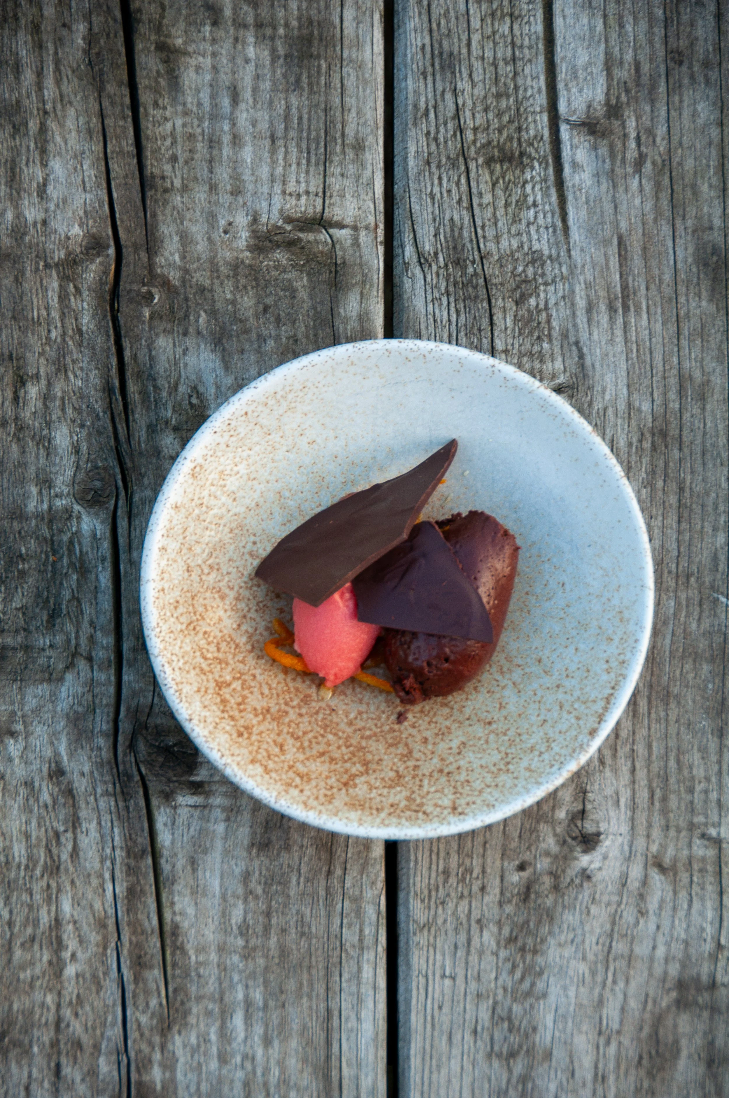 Chocolate crémeux, blood orange sorbet, burnt orange, cocoa tuille