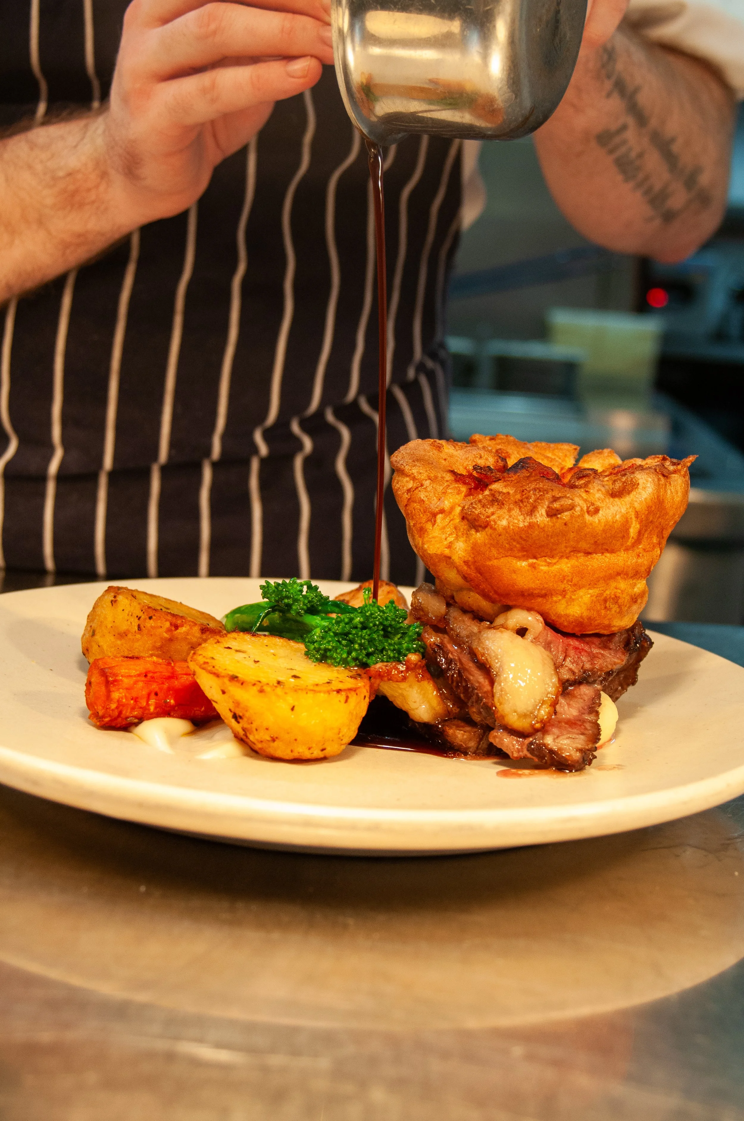 Sunday Roast - Chef pouring gravy