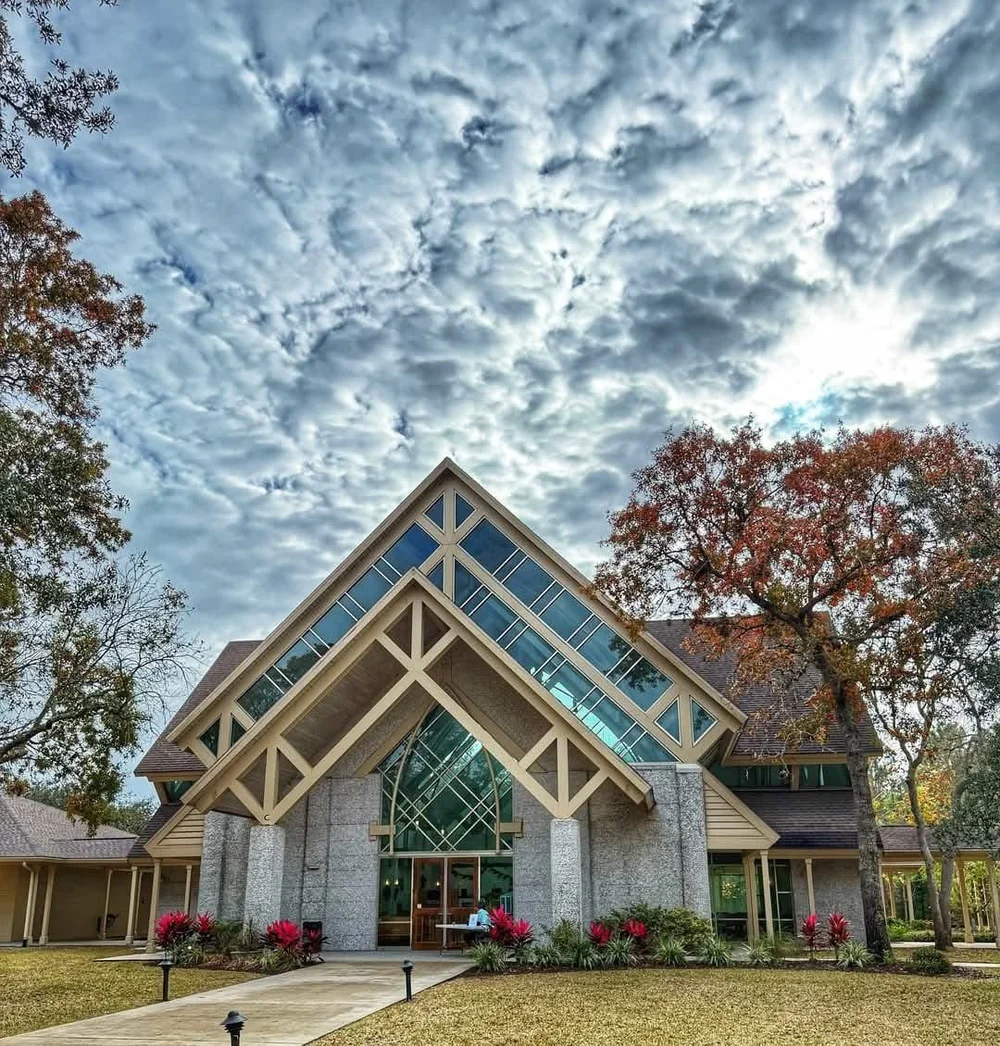The Church at St. Francis in-the-Field, its glass gable front beneath an open sky