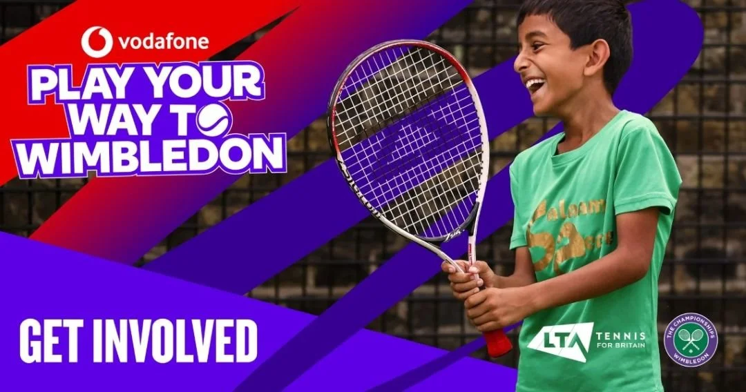 A young boy smiling and holding a tennis racket on a tennis court, with tennis logos and promotional text for Wimbledon, emphasizing involvement in tennis.