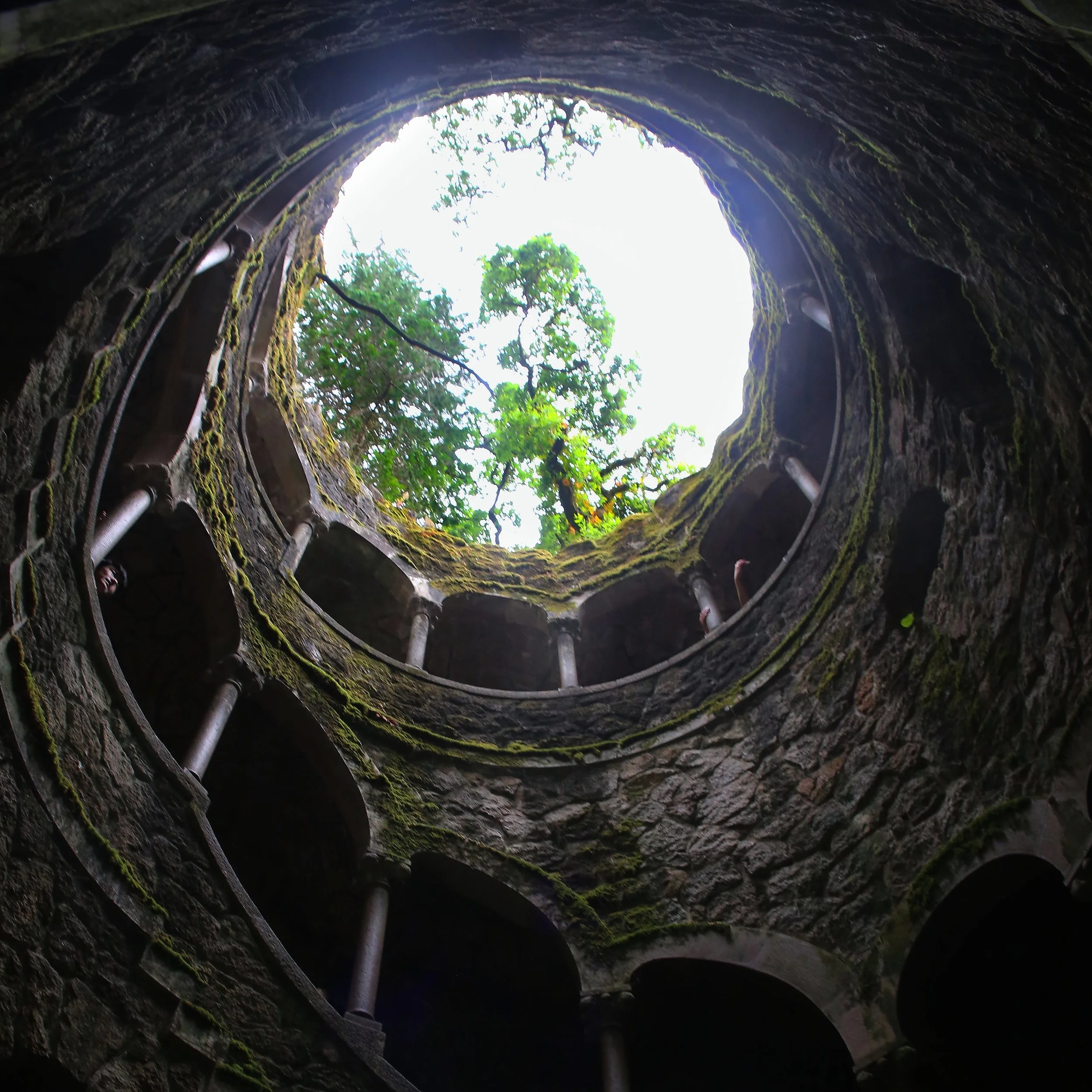 Looking up from the Initiation Well at Quinta da Regaleira feels like stepping into another world. The spiral staircase, the light above, and the layers of stone create a scene that is both mysterious and inspiring.

This iconic spot is one of the hi