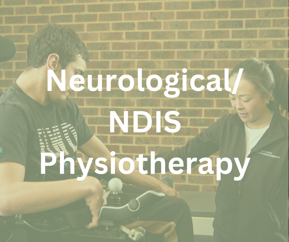 A male patient in a wheelchair receiving physical therapy from a female physiotherapist in a clinical setting with a brick wall background.