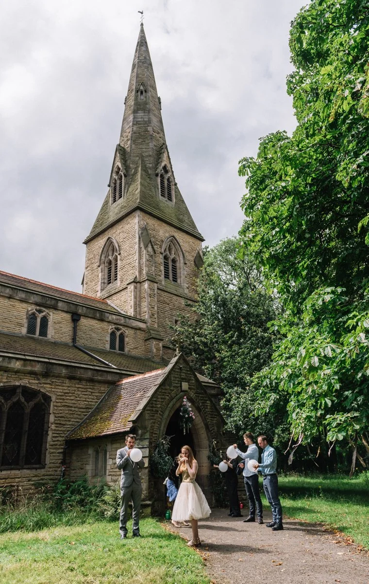 whalley-range-manchester-wedding-photographer-guests-arriving-ceremony-714.JPG