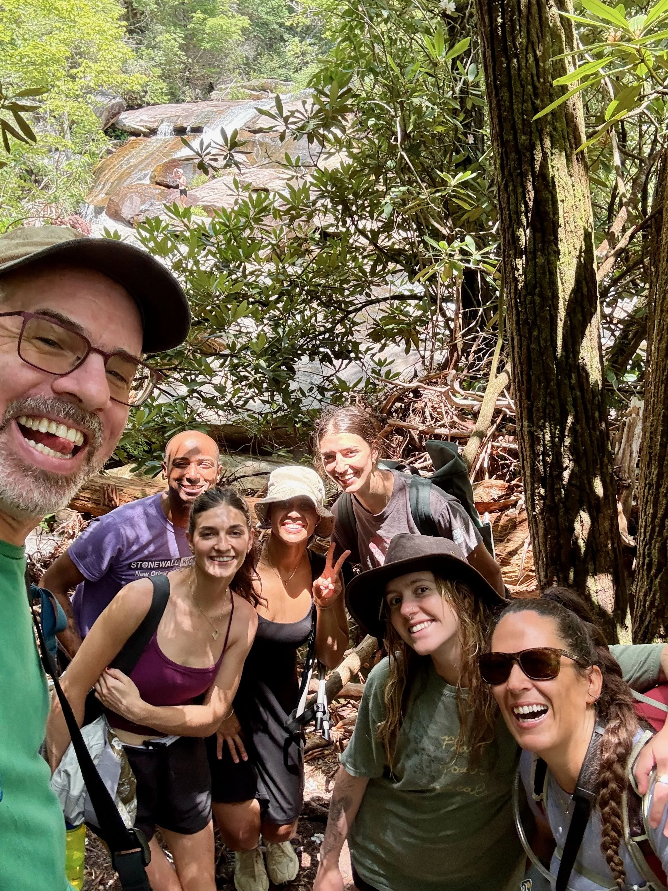 clinical herbalism, appalachian herbal medicine, place based herbalism, herbalist certification, school of herbal medicine, coreypine shane herbalist, coreypine book, pines herbals, herbalism students enjoy a plant walk with teacher CoreyPine Shane