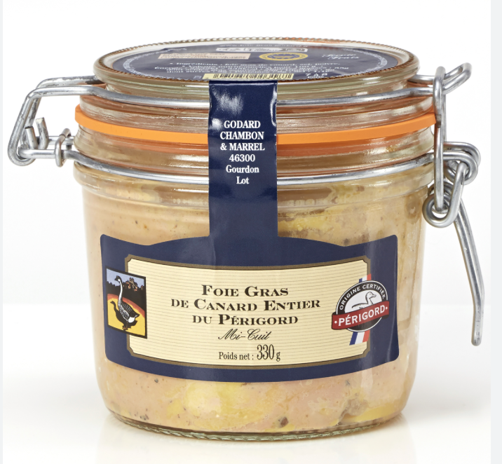 Glass jar of foie gras with a metal clasp lid, label indicates it's from Périgord, France, purchased in Goudron, with a net weight of 330 grams.