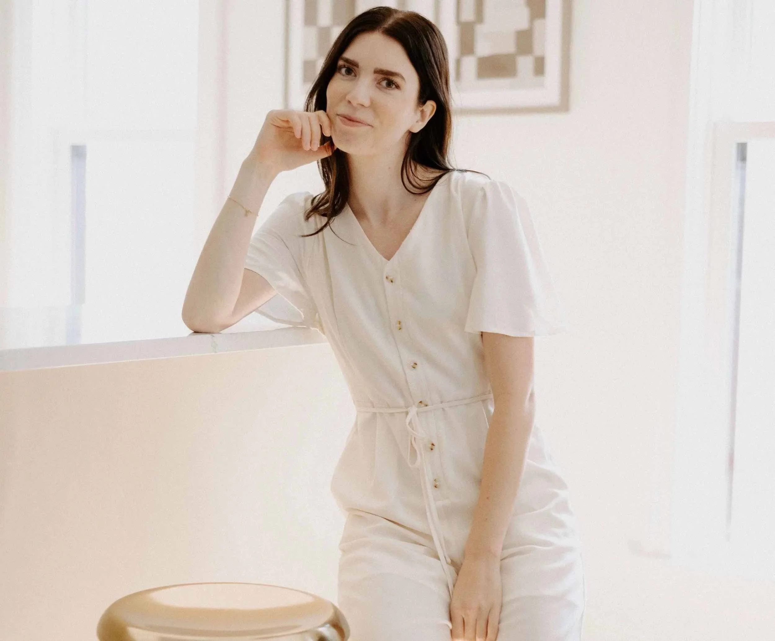 Image of Sarah Rexford wearing a cream jumpsuit