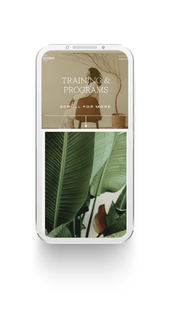 A phone mockup of The Boldest Me website design