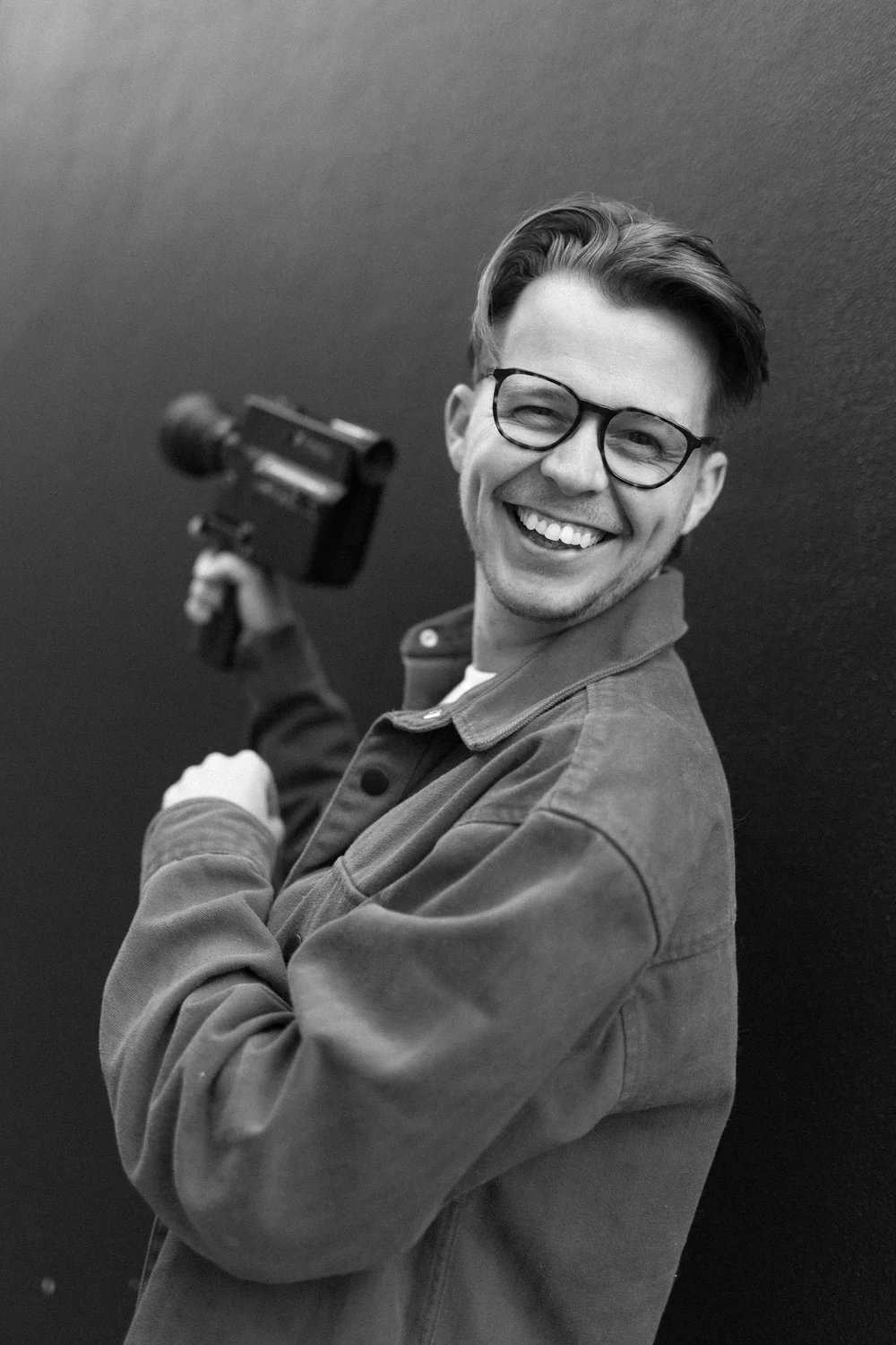 Michael from Myr Films laughing with a Super 8 camera
