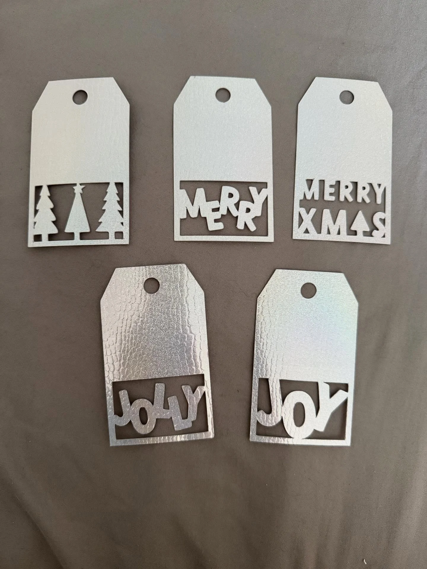 🎁 Sparkle Up Your Presents! 🎁

Looking for that extra special finishing touch this Christmas? ✨ I&rsquo;ve been busy crafting these handmade, die-cut gift tags!

Made from beautiful shimmering silver cardstock, these tags feature festive cutouts li
