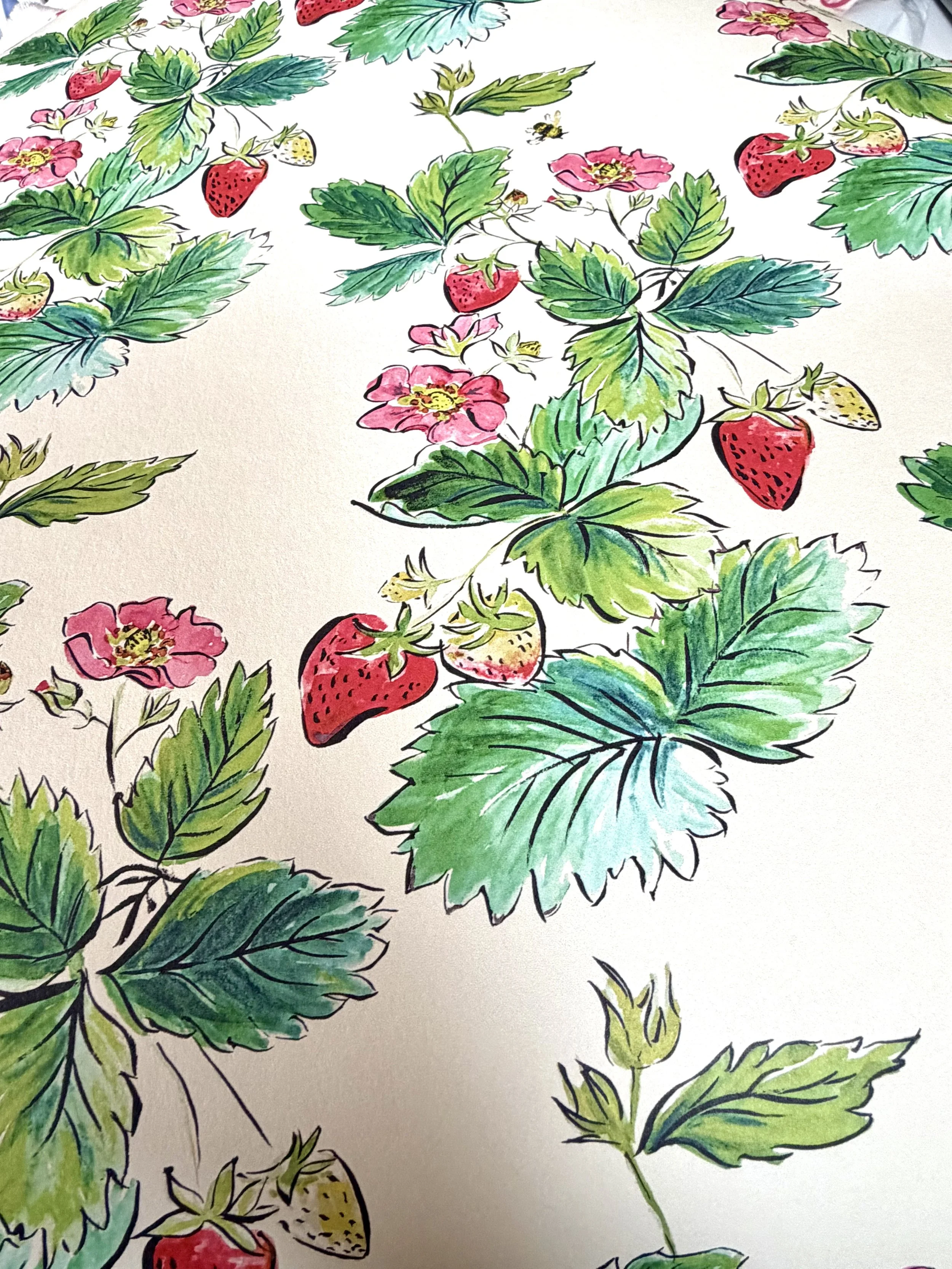 Watercolor illustration of strawberry plants with green leaves, pink flowers, and ripe red strawberries on white background.