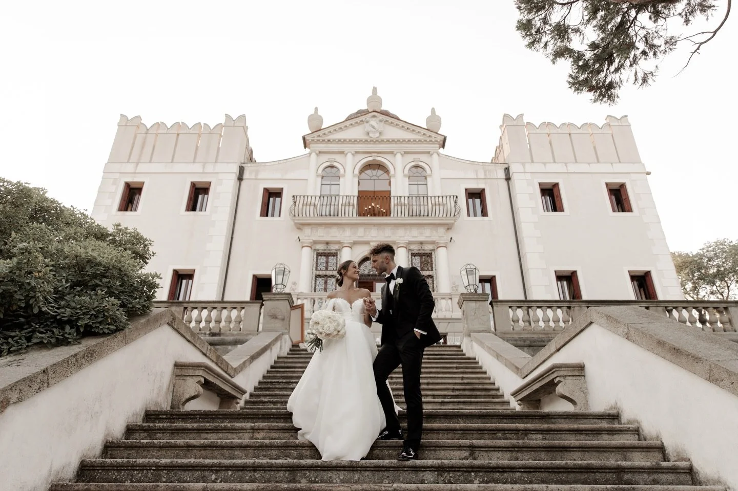 A timeless Venetian villa where architecture becomes part of the celebration.

Grand staircases. Symmetry. Soft natural light falling over stone.

Before flowers are placed, before music begins &mdash; the atmosphere is already there.

Choosing a his