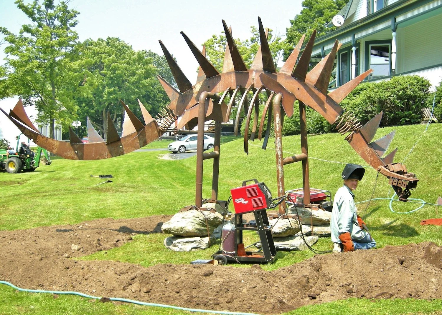 3 dinosaur building 4x6 Opener.JPG