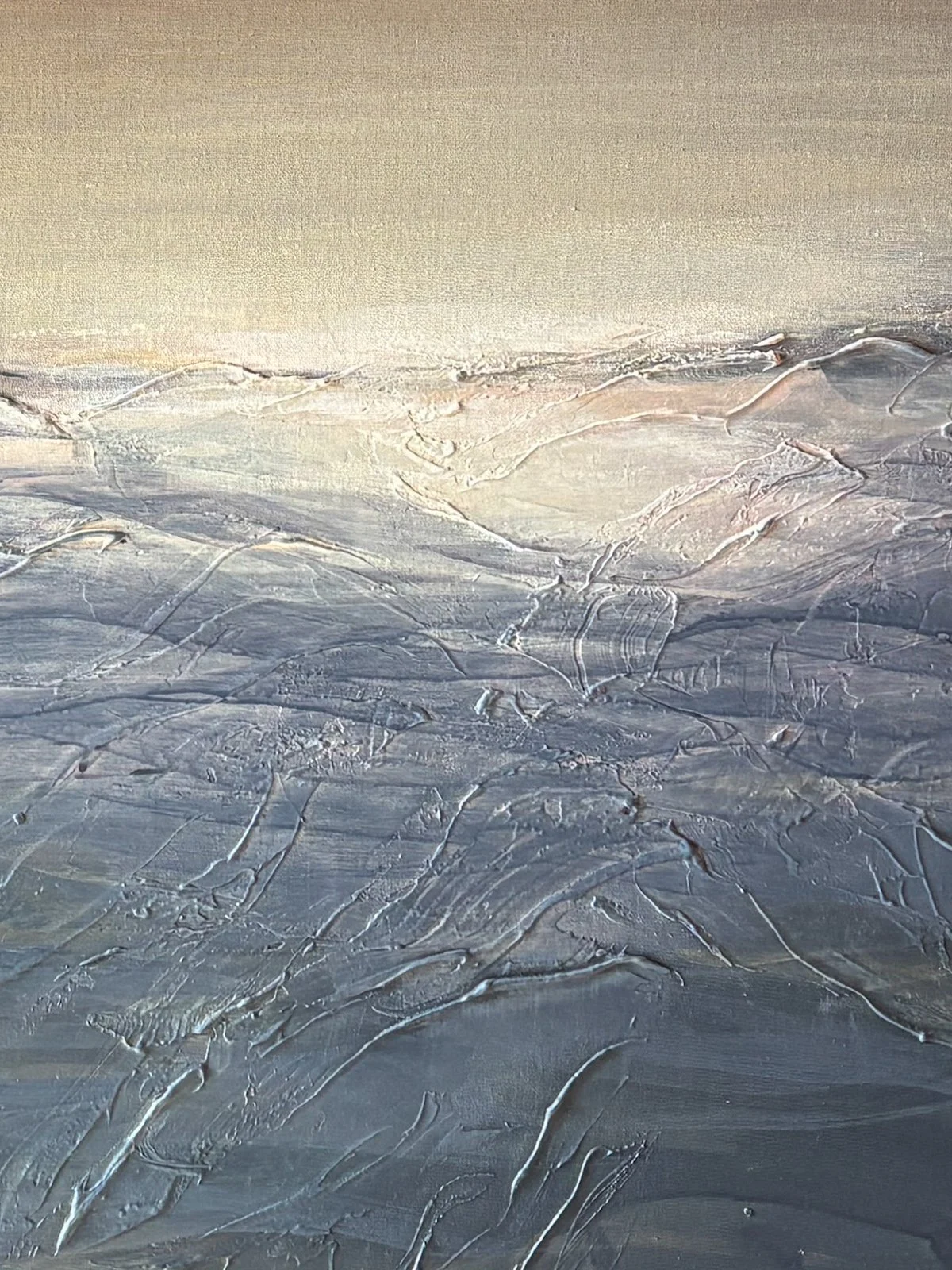 Close-up of a textured painted surface with horizontal lines and layered strokes in shades of gray, silver, and beige. Laut, an original painting by Janne de Boer, mixed media on canvas.