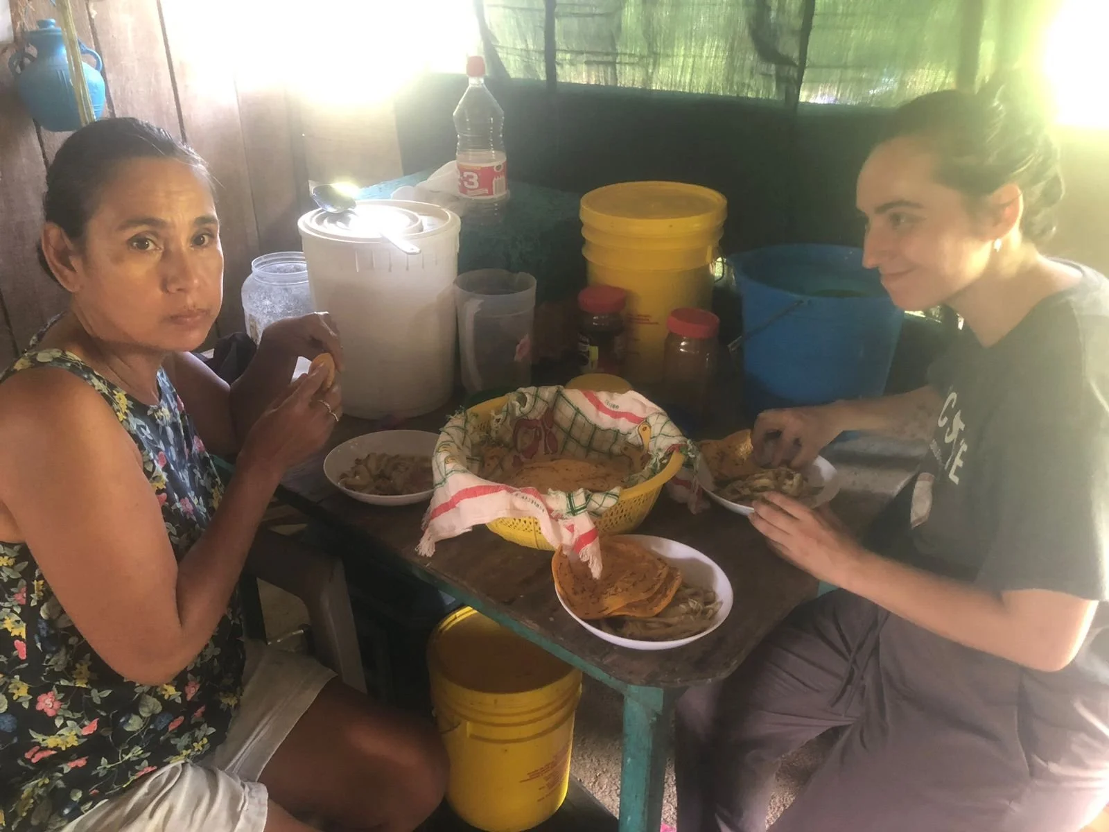 Celini and I sharing a home-cooked Belizean meal