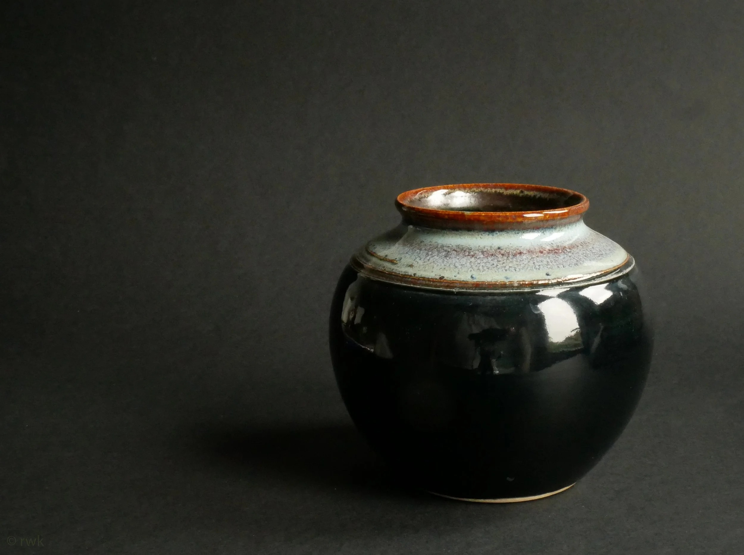 Black Jar. White Stoneware. 100mm(h) 100mm (dia). rwk006