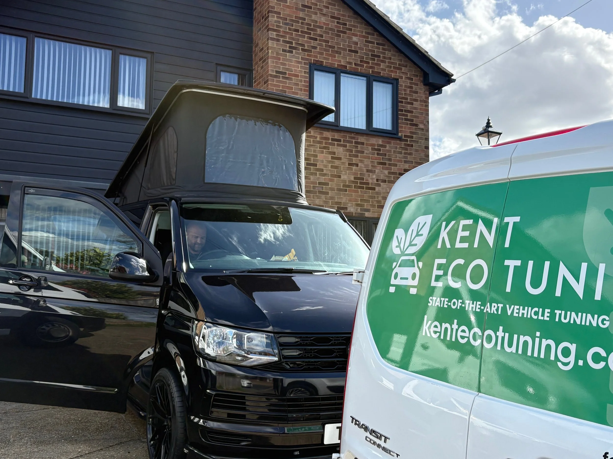 Kent Eco Tuning van parked on a driveway next to a black VW camper in Sevenoaks