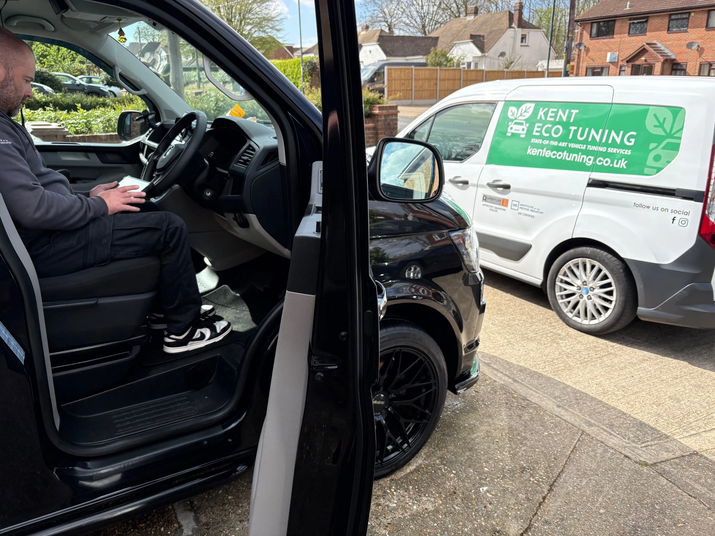 Professional mobile car tuning Rochester - Kent Eco Tuning technician on-site with service van