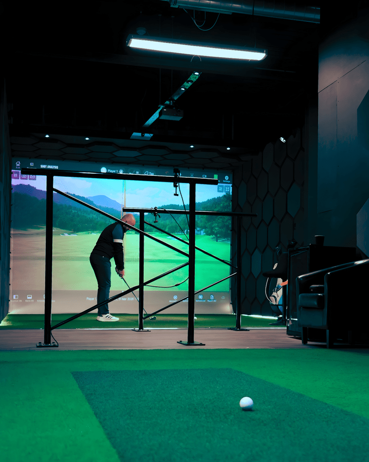 A TrackMan IO simulator bay at Fairways London