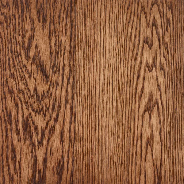 Close-up of a wooden surface with a natural grain pattern.