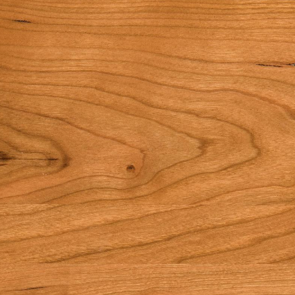 Close-up of a wooden surface with visible grain patterns and a small knot.