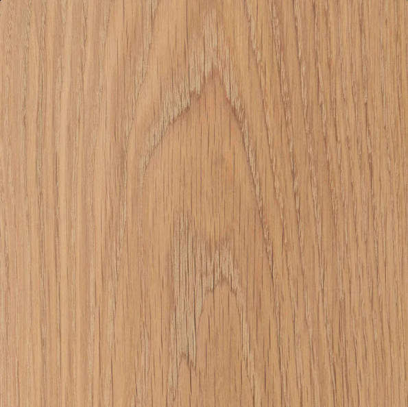 Close-up of a wooden surface with a visible wood grain pattern.