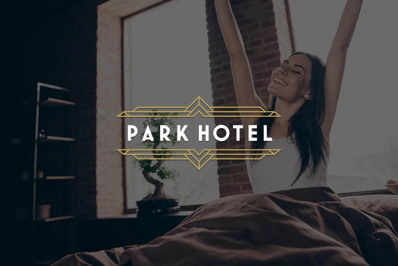 A woman stretching in her bedroom with sunlight coming through the window, with a bed, a side table, and a decorative plant, branding for Park Hotel.