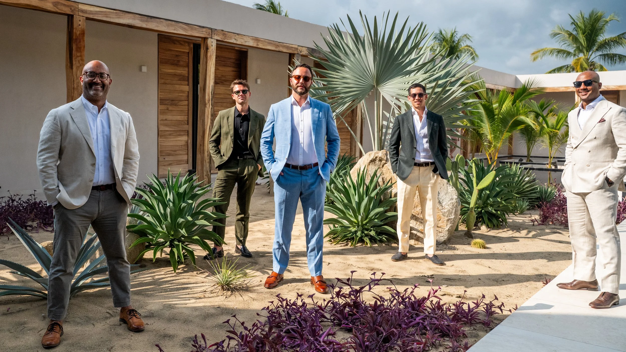 Luxury villa destination wedding in Puerto Escondido, Oaxaca, photographed with a documentary and high-end storytelling style. Groom with his friends posing before the ceremony for the wedding photoshoot.
