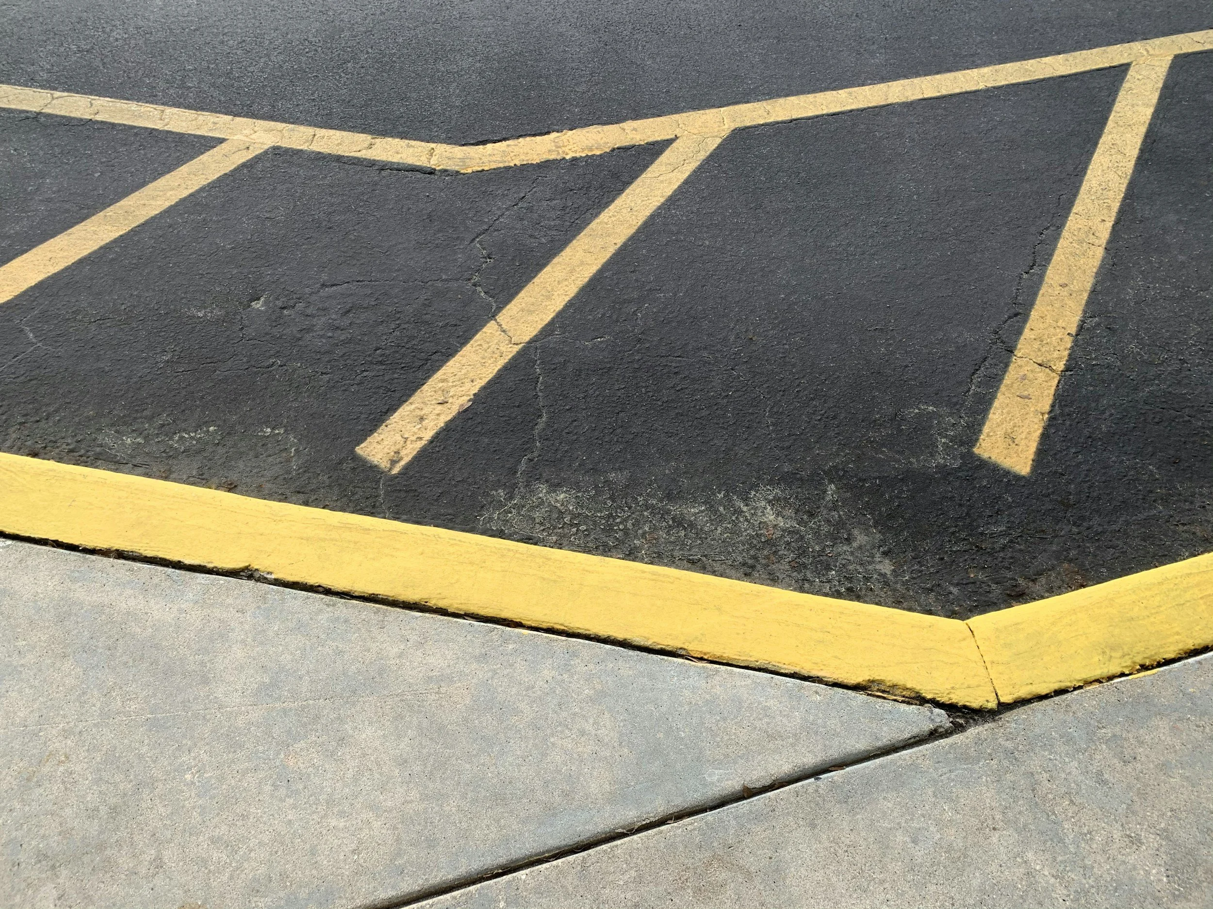 Freshly sealcoated and striped commercial parking lot in Oklahoma