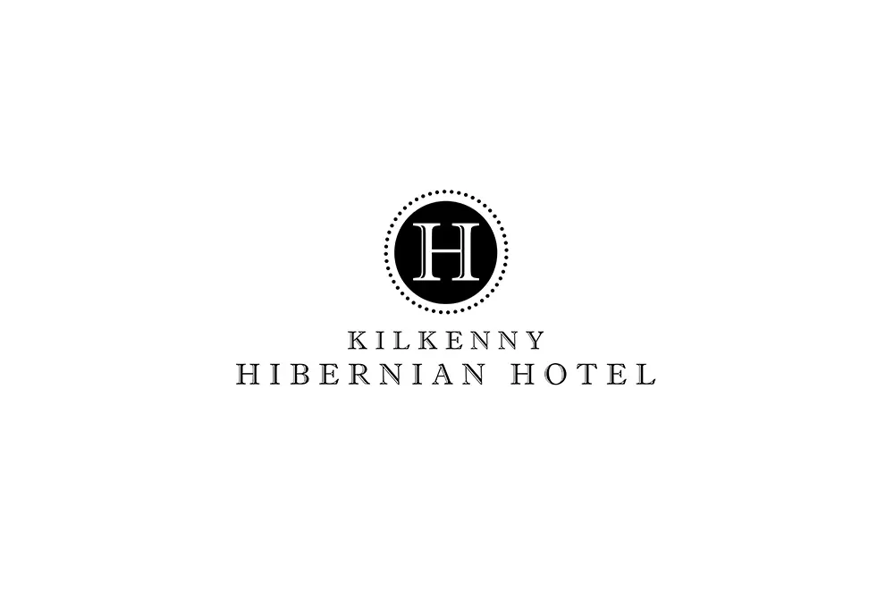 Logo of a large black circle with a white 'H' inside and 'Kilkenny Hibernian Hotel' written below.