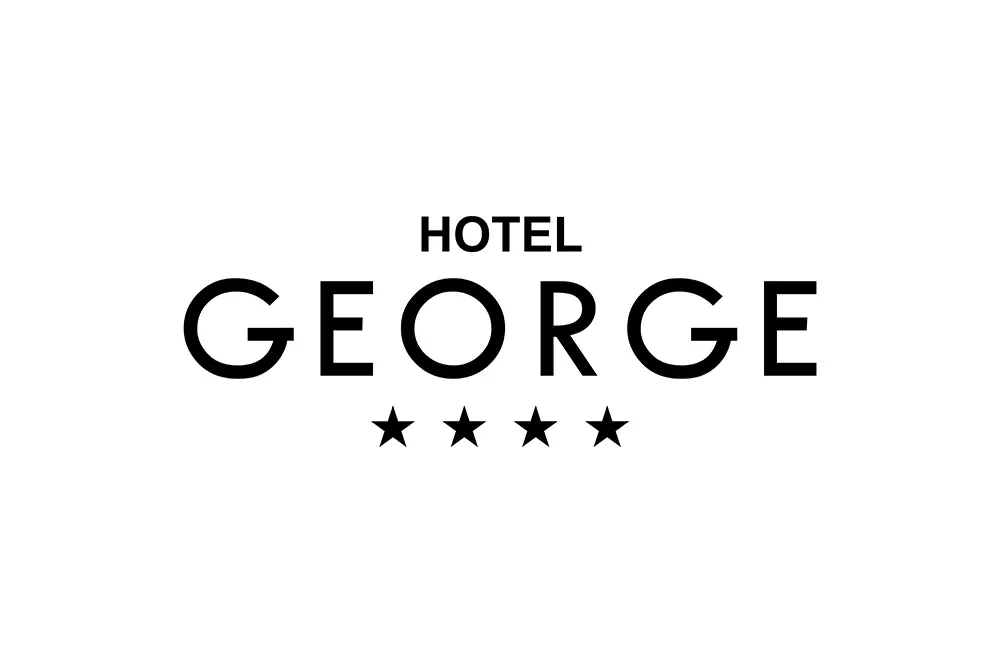 Black and white George Hotel logo with four black stars below the name of the hotel.