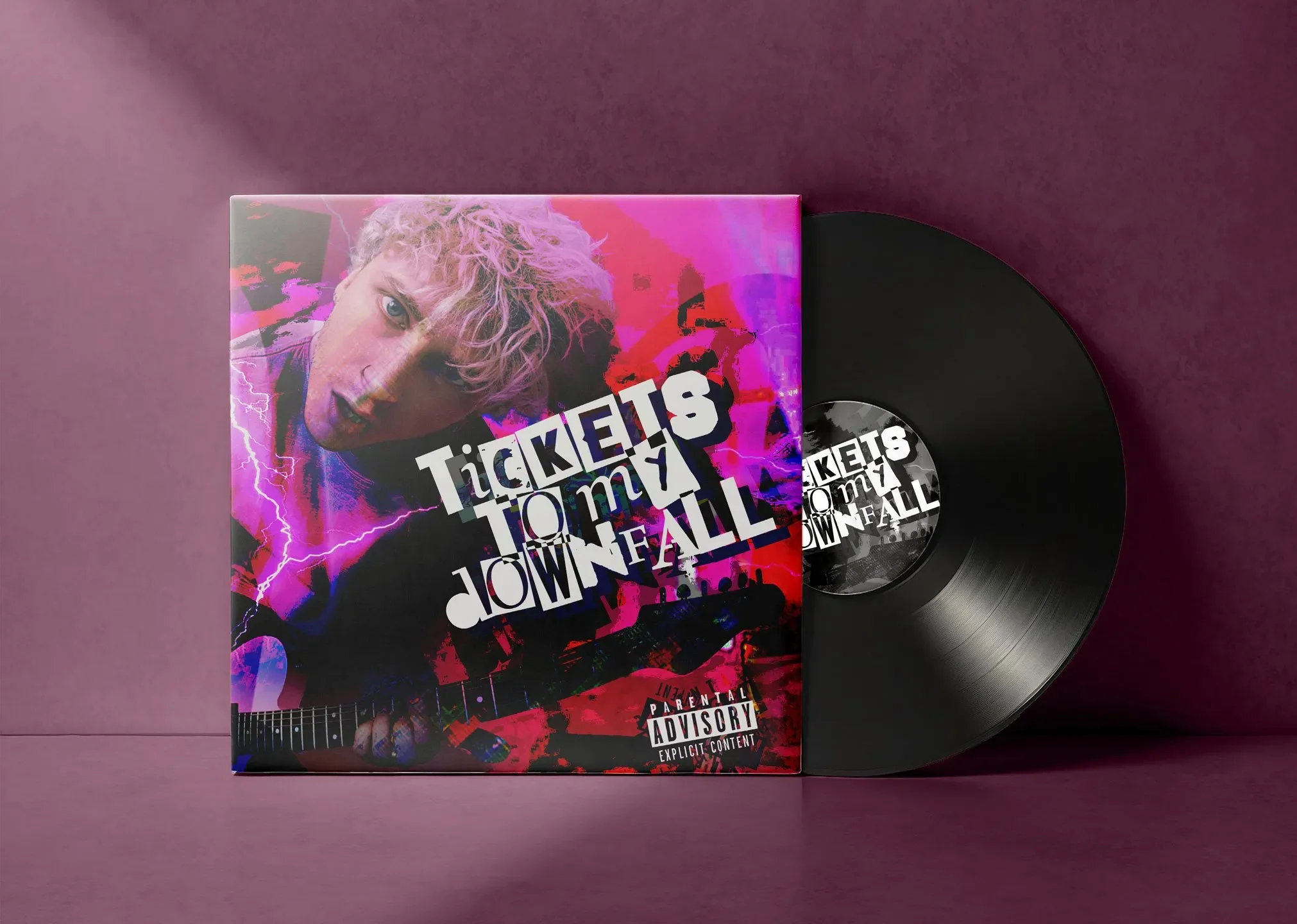 Vinyl record album cover titled "Tickets to My Downfall" featuring a young man with curly blonde hair and a guitar, with vibrant pink and purple graphics and lightning effects.