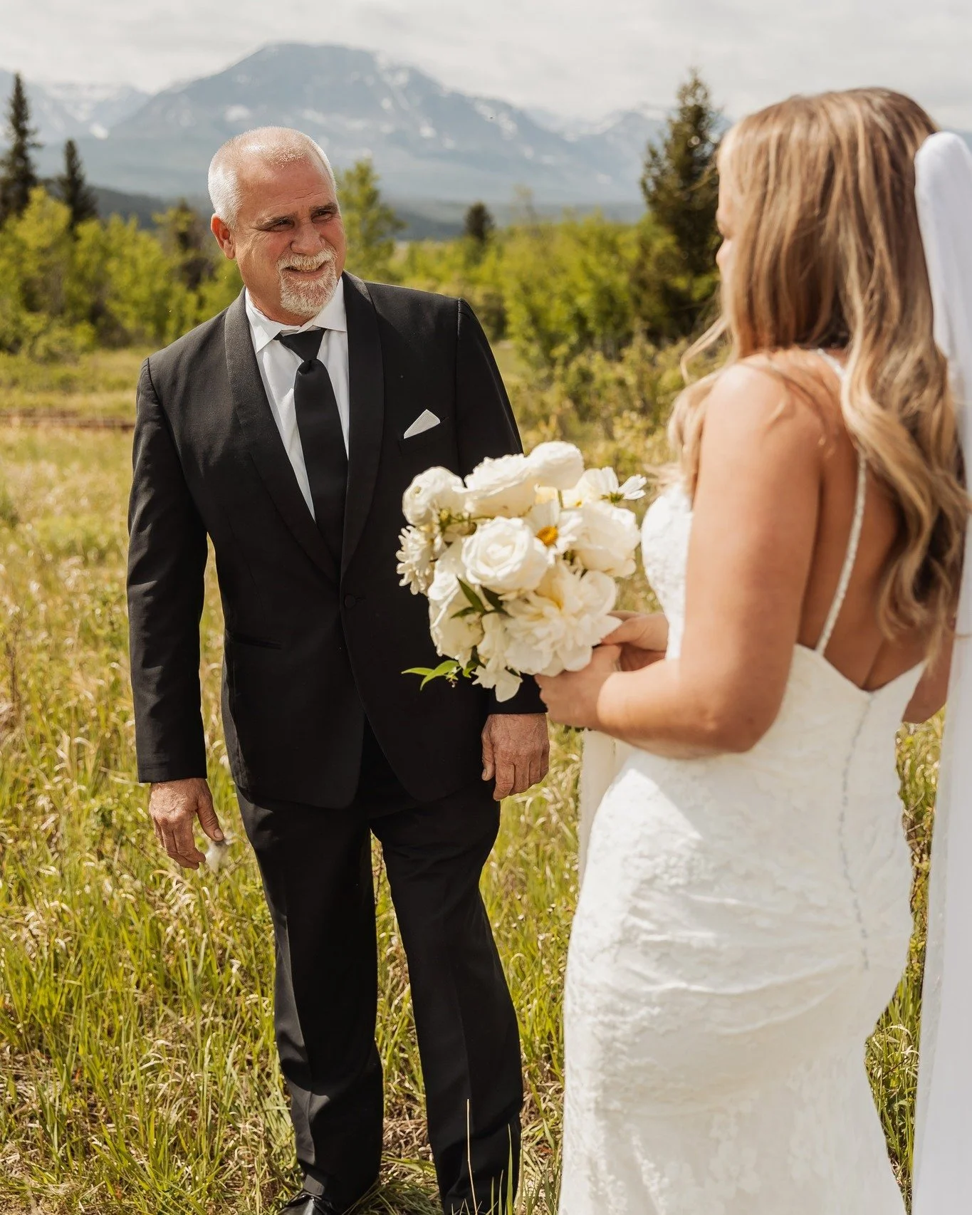 Sometimes the most meaningful moments are the reactions that you didn't expect! We love to see the emotion in a parents' eyes during the wedding day. 

The candid moments and reactions are some of our top favorites to capture.