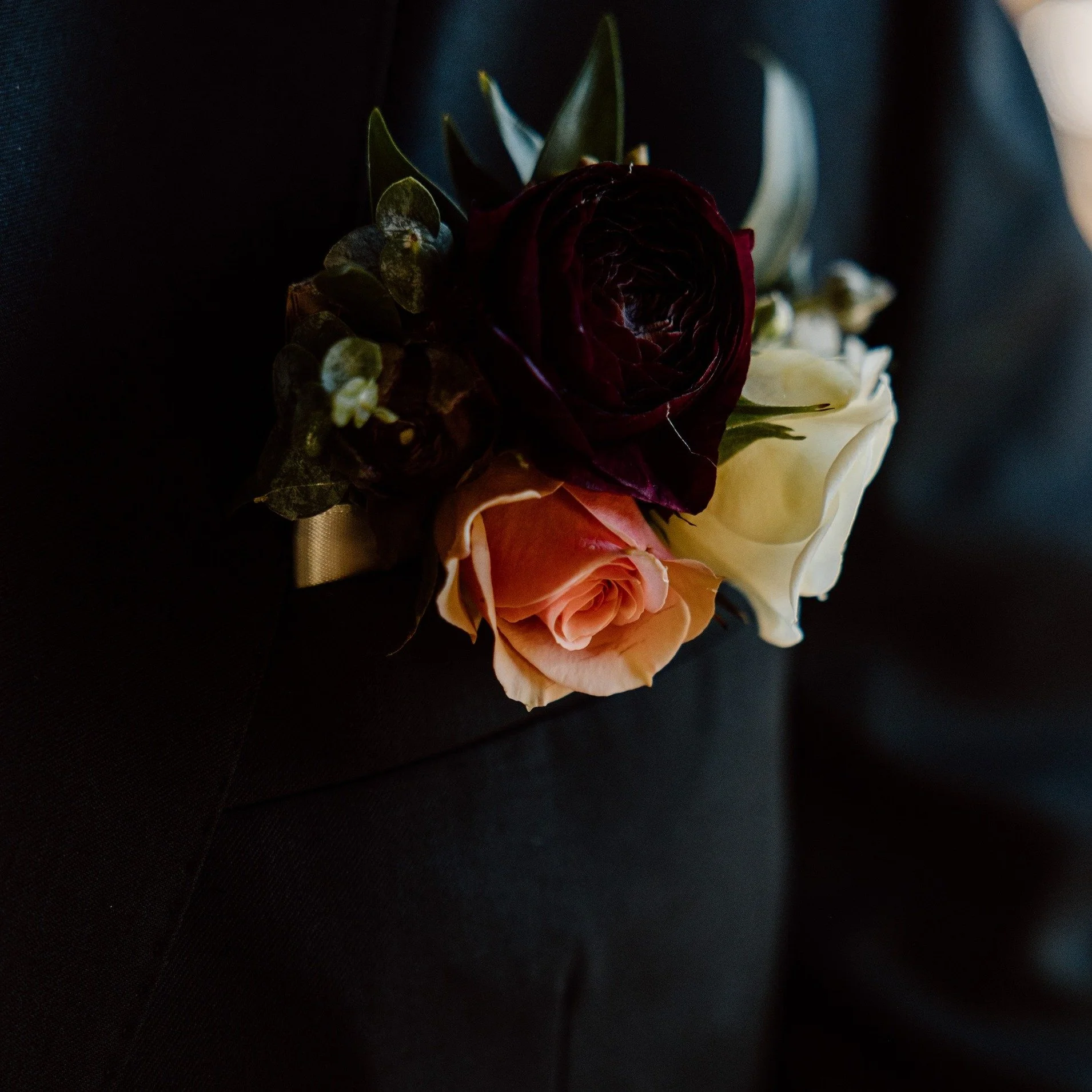 The boutonniere tip! Have someone in your party designated for delivery and for putting those boutonniere's on. Having a mom or a special person putting them on makes for great photos. If you're planning on wearing them for your day, have that person