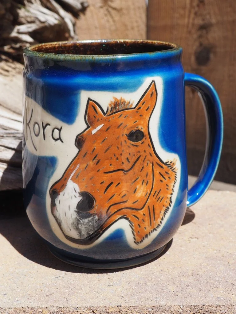 Cobalt blue mug with a hand-carved chestnut horse portrait named Kora