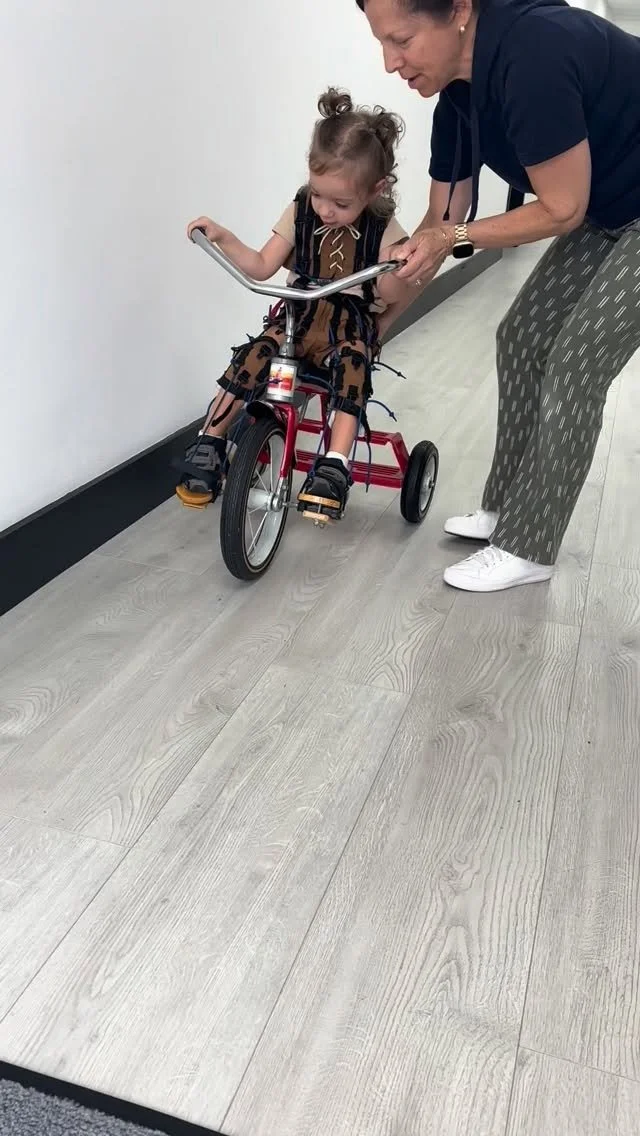 π World Cerebral Palsy Day π
Every single bit of progress Cecilia makes is the result of so much hard work and determination. Watching her ride a tricycle in the Adeli suit this morning is a reminder of how far she’s come and how much strengt