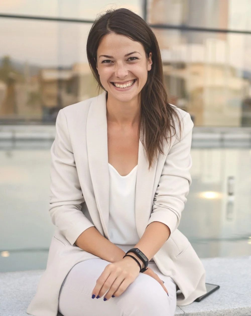 A female therapist from Sarasota smiles after a counseling session with Gail Gerbig LMHC of Seaside Mental Wellness in Lakewood Ranch, Florida.