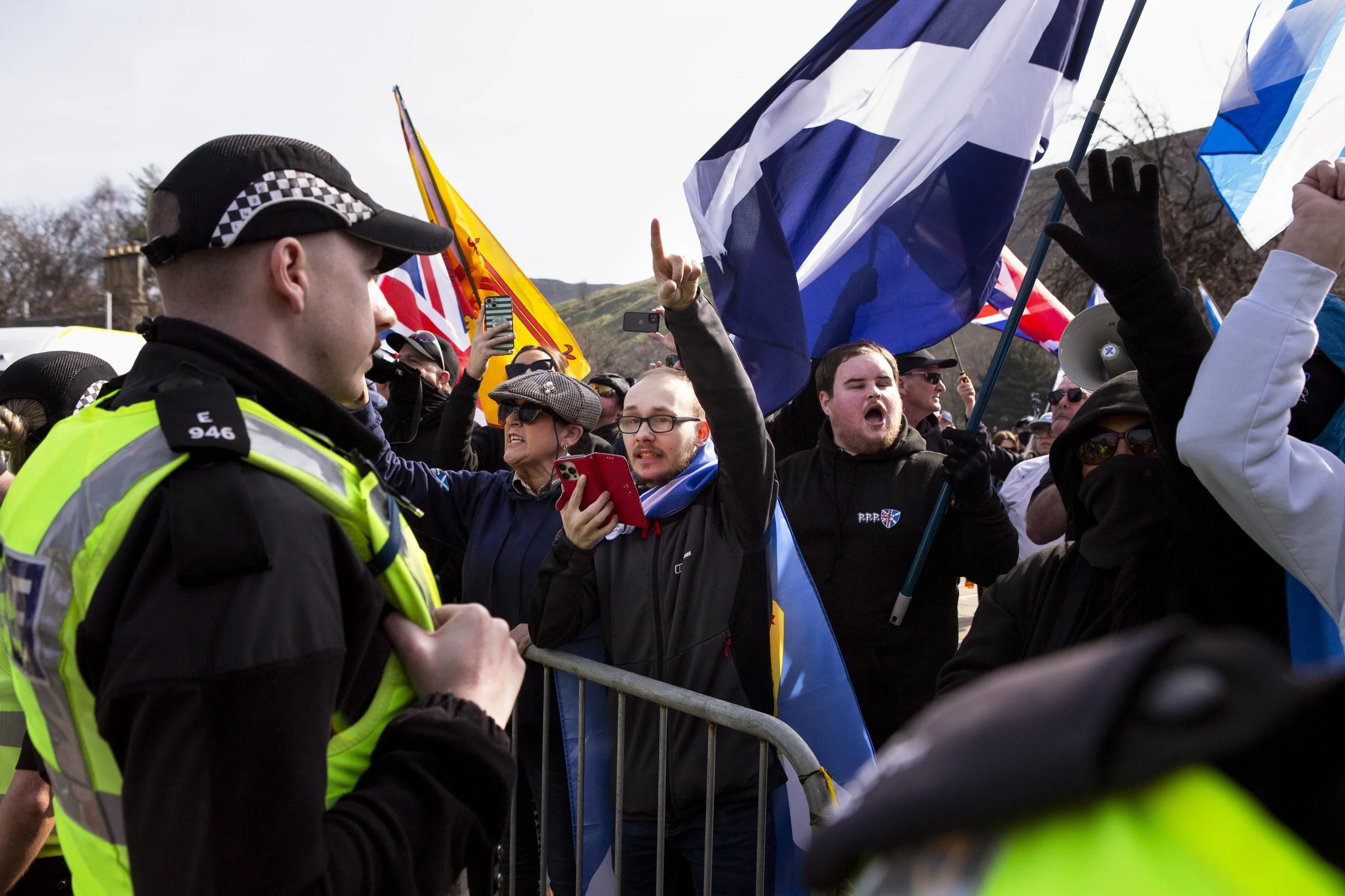 Protesters from the group “Unite the Clans” shout at Stand Up to Racism and Women Against the Far Right demonstrators outside Holyrood in Edinburgh. The group, previously known as “Aberdeen Against Illegal Immigration,” organised a rally outside of t