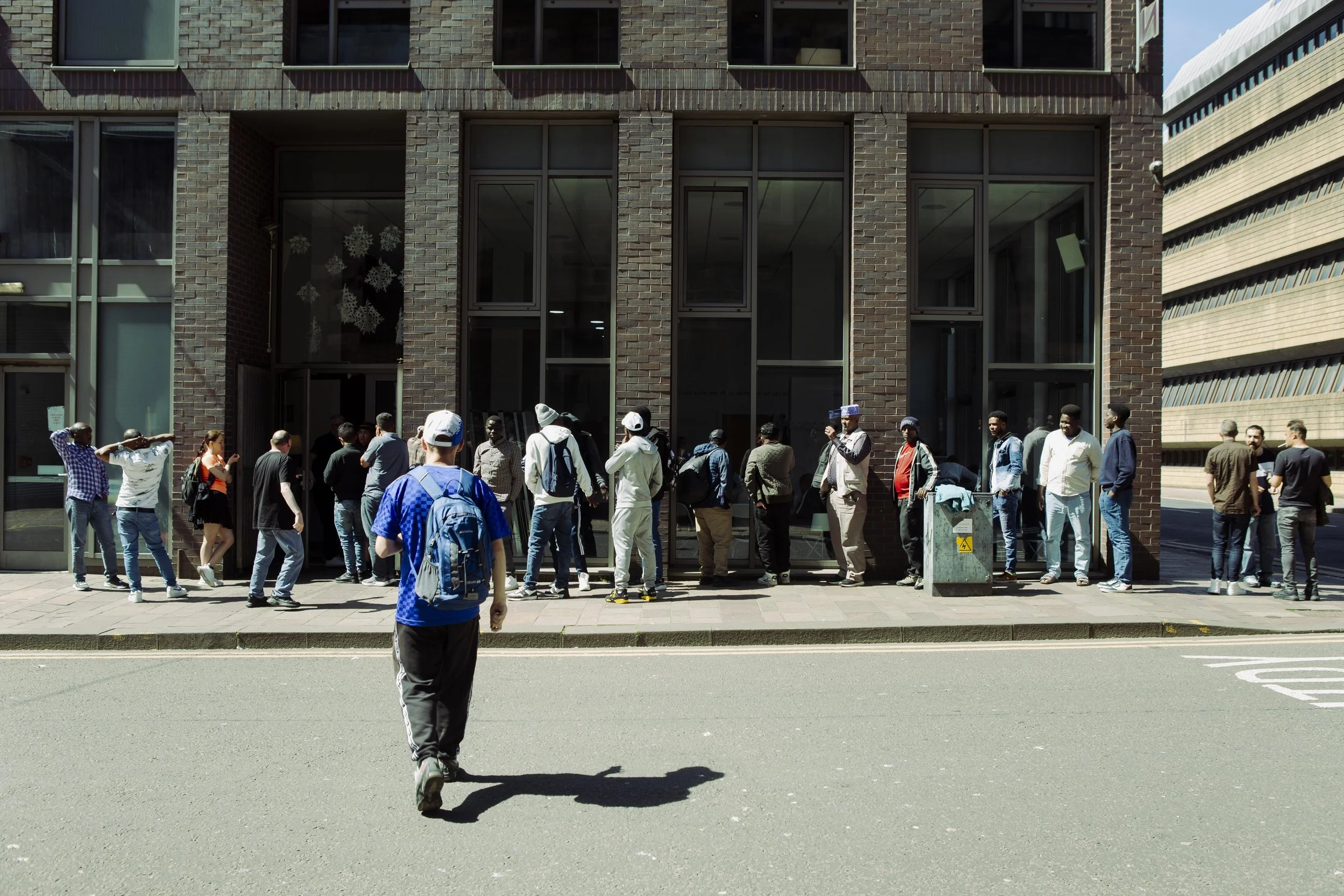 People queue outside Glasgow City Mission during a lunchtime service. The Christian charity, founded in 1926, has focused on supporting Glasgow’s homeless population since the 80s. As part of their services, the Mission provides daily meals of lunch 